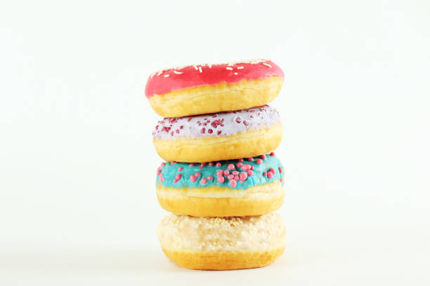 Minimal composition in vibrant colors with bright glaze donuts.