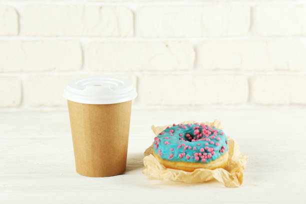 istock Minimal composition in vibrant colors with bright glaze donuts. 1140528430