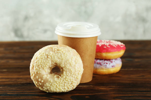 istock Minimal composition in vibrant colors with bright glaze donuts. 1140528499