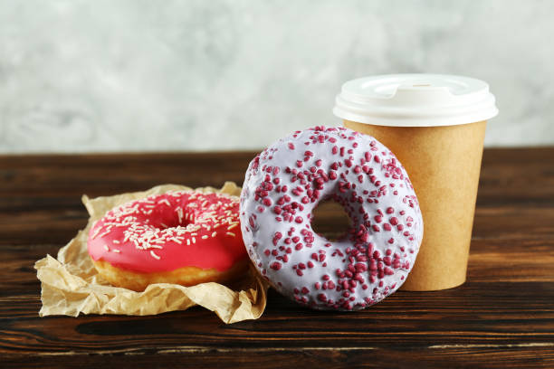 istock Minimal composition in vibrant colors with bright glaze donuts. 1140528501