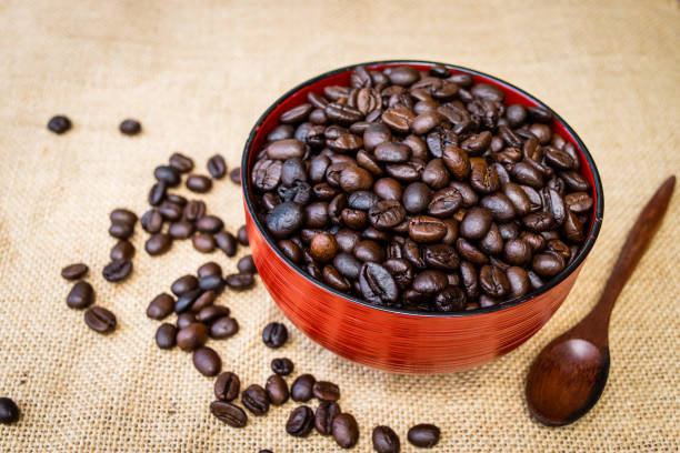istock Coffee beans in a cup of coffee 1140529192