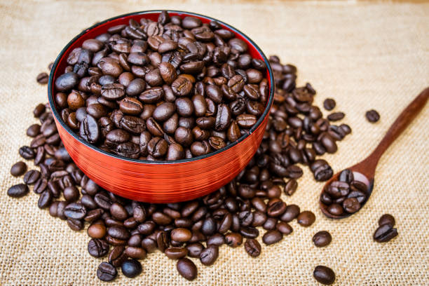 istock Coffee beans in a cup of coffee 1140530940
