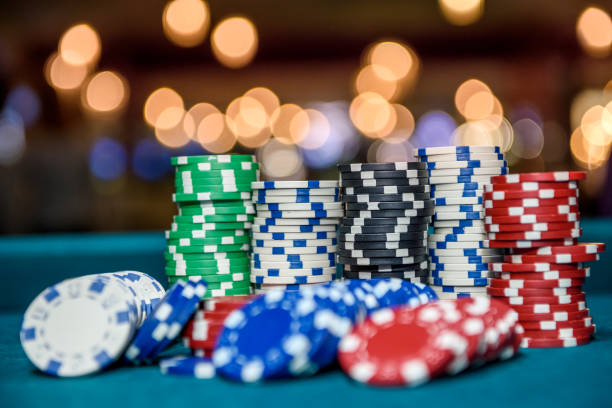 istock Colorful casino chips on table close up 1140531702
