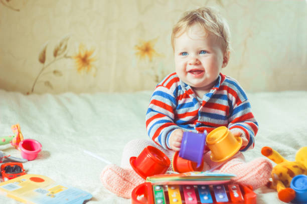 istock The child plays on the bed 1140533698