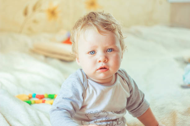 istock The child plays on the bed 1140533699