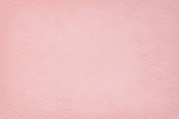 istock Pink cement wall texture for background and design art work. 1140535398
