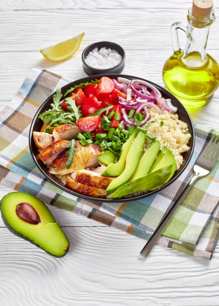 istock chicken bowl with couscous, greens and veggies 1140536318