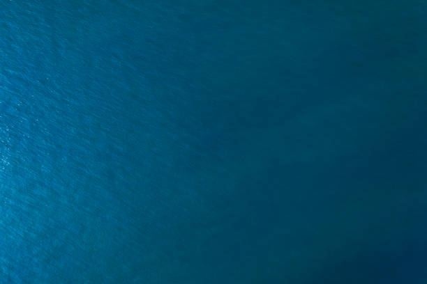 istock Aerial top view of Blue ocean surface background 1140536977