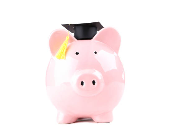 istock Piggybank with graduation cap isolated on white background 1140539012