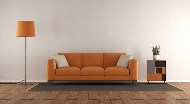 istock Minimalist white and orange living room 1140542249