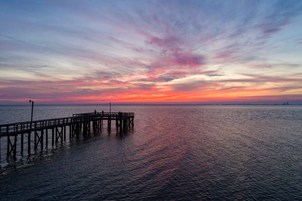 istock Sunset over Mobile Bay on the Alabama Gulf Coast 1140542521