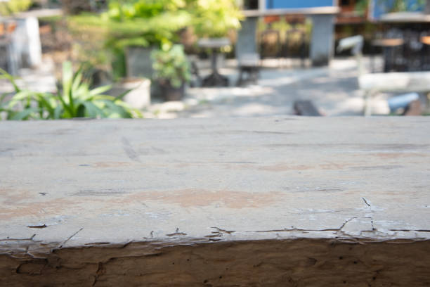istock Empty wood table in the garden,For product placement. 1140542559