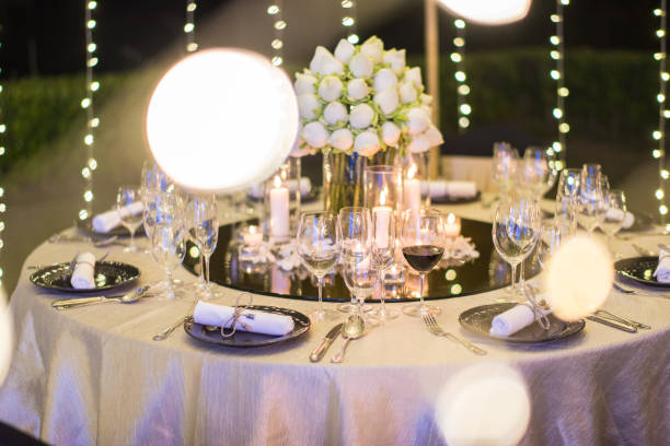 istock Table setting at a luxury wedding and Beautiful flowers on the table. 1140542730