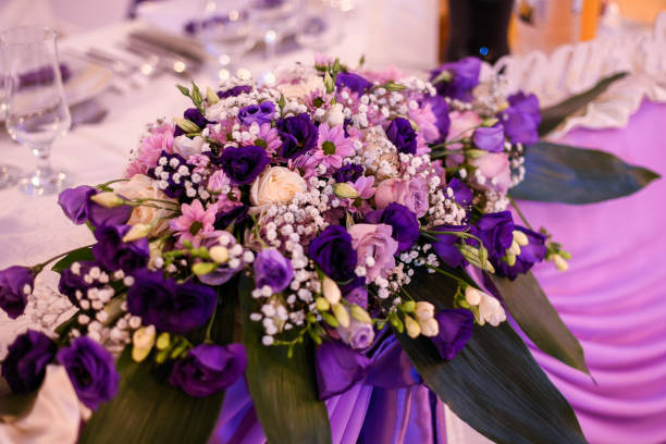 istock Beautiful purple flowers on table 1140542741