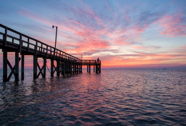 istock Sunset over Mobile Bay on the Alabama Gulf Coast 1140543325