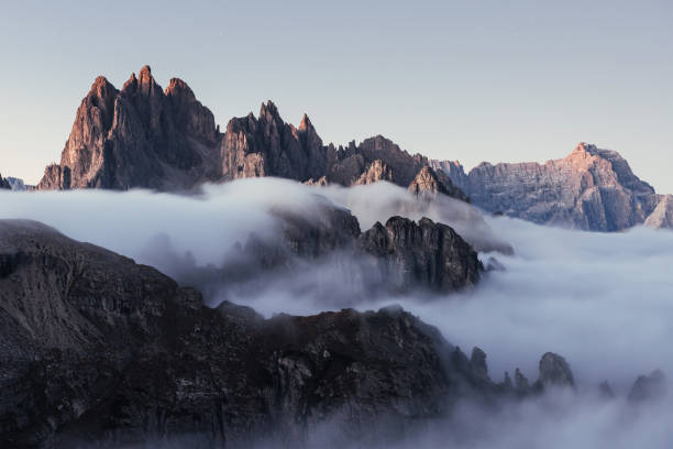 istock Dreamy hills on the daylight gets filled with hard mist from the under ground 1140543336
