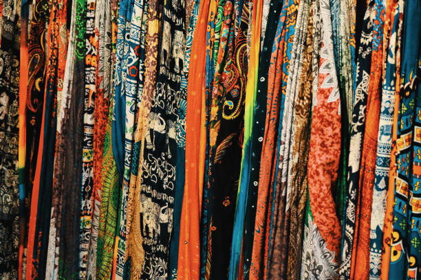 istock a large number of colorful shawls, patterned textiles, background 1140544831