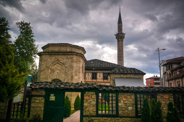 Exterior view to Spotted Mosque Alaca Cami Kalkandelen aka painted mosque, Tetovo, North Macedonia Exterior view to Spotted Mosque Alaca Cami Kalkandelen aka painted mosque in Tetovo, North Macedonia tetovo stock pictures, royalty-free photos & images