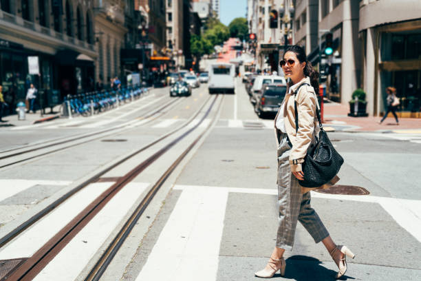 istock young female asian office lady going to work 1140545250