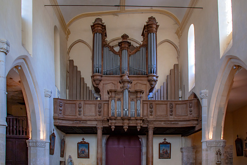 Shot of the organ battery inside the abbey built in 650 where is in the nave the burial of Dom Pérignon, precursor of champagne making techniques, at zoom 18/135, 200 iso, f 3.5, 1/25 second