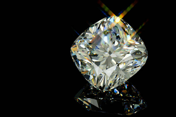 istock Sparkling cushion cut diamond on black glossy background 1140547365