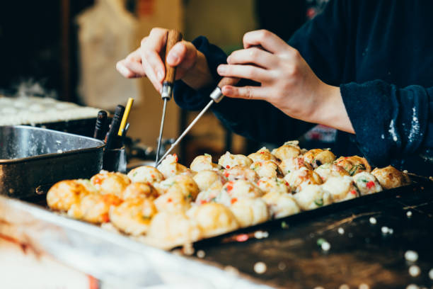 istock Process to cooking takoyaki on hot pan 1140547403