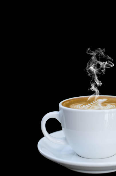 istock White cup of hot coffee isolated on black background 1140547650