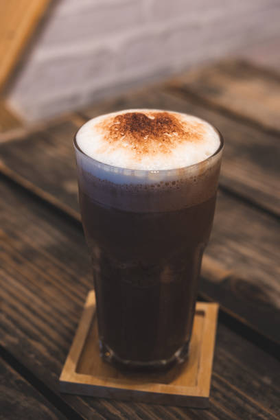 istock Chocolate smoothie, Cocoa drink, chocolate cocktail. on a wooden background. 1140548820