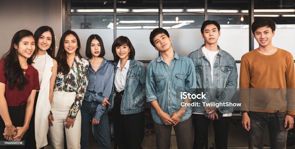 Group of young confidence Asian face standing looking at camera Confidence Asian Thai face with happiness Classroom Stock Photo