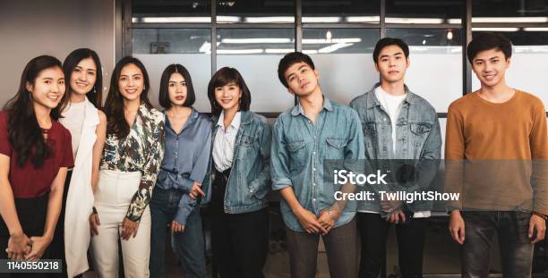 Group Of Young Confidence Asian Face Standing Looking At Camera Stock Photo - Download Image Now