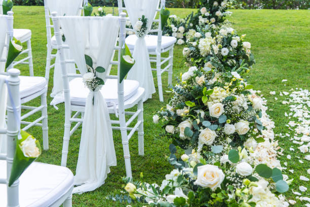 istock Chair decorated with flowers in Wedding ceremony. 1140551396