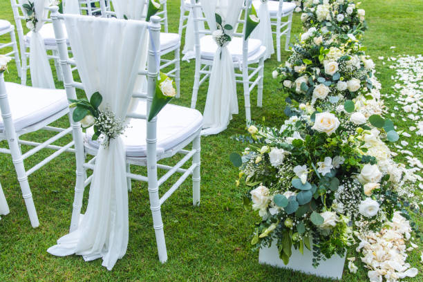 istock Chair decorated with flowers in Wedding ceremony. 1140551411