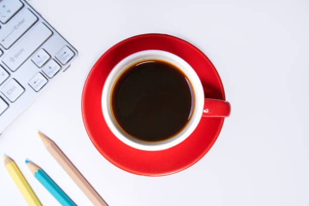 istock red cup of coffee on white table 1140552336