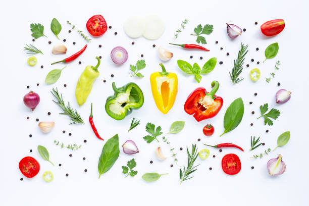 istock Various fresh vegetables and herbs on white background. Healthy eating concept 1140552482