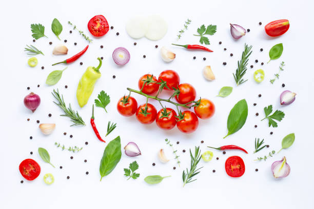 istock Various fresh vegetables and herbs on white background. Healthy eating concept 1140552512