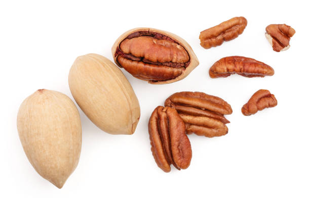 istock pecan nut isolated on white background. Top view. Flat lay 1140553736