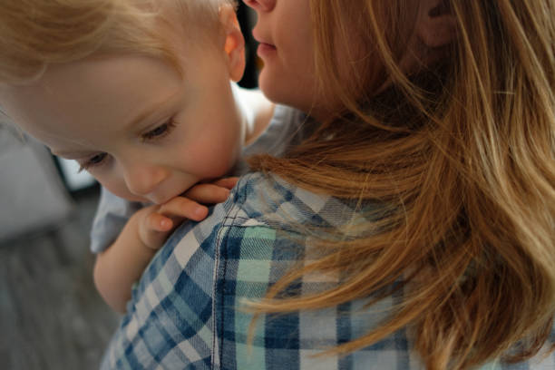 istock Baby crying on mom's shoulder 1140554791