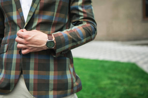 istock Businessman adjusting his stylish suit 1140555082
