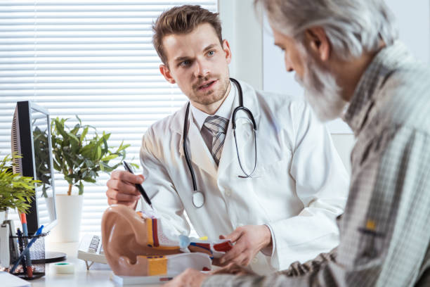 Doctor consultating patient about deafness