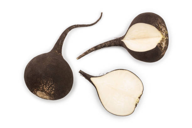 istock Black radish with half isolated on white background. Top view. Flat lay 1140556805