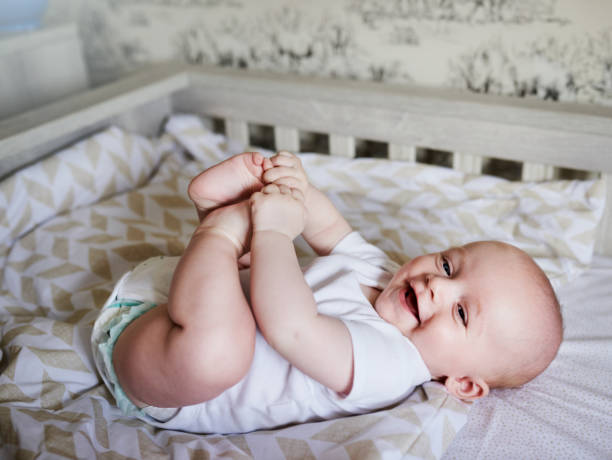When a baby smiles, so does your heart stock photo
