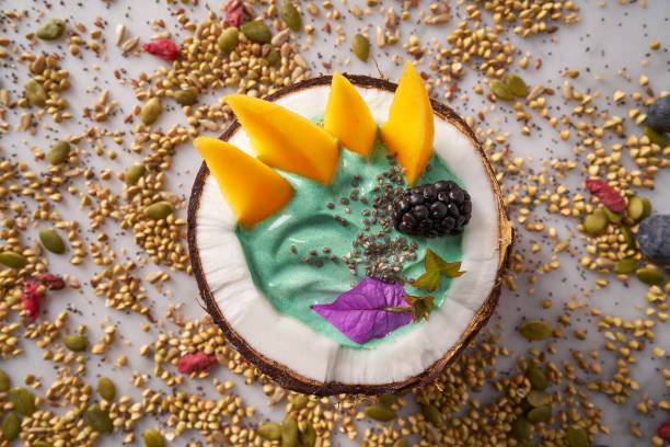 istock Spirulina bowl smoothie in coconut blackberry mango 1140557128