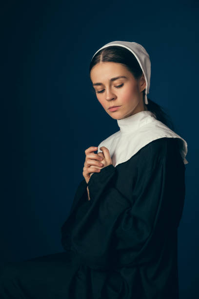 istock Medieval young woman as a nun 1140559672