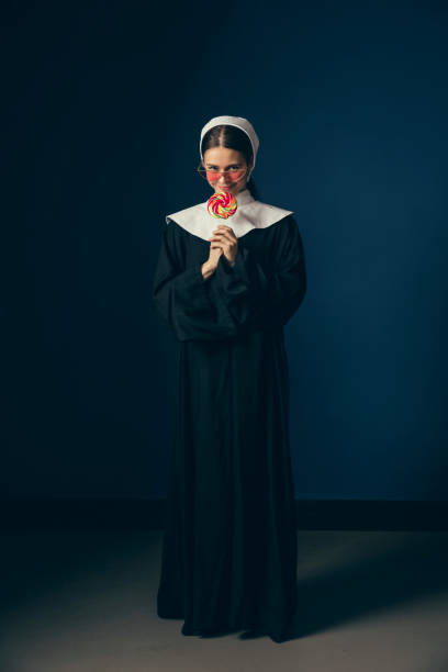 istock Medieval young woman as a nun 1140559687