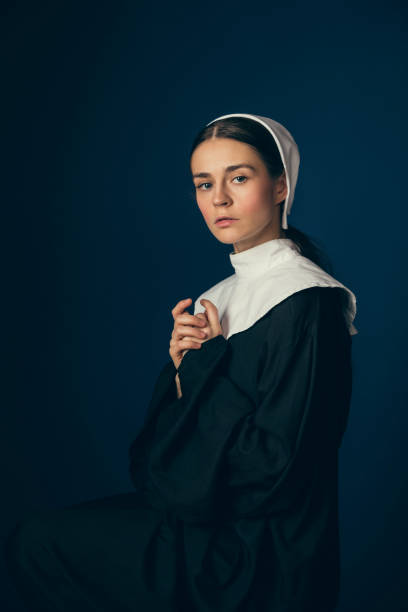istock Medieval young woman as a nun 1140559694