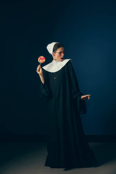 istock Medieval young woman as a nun 1140559710