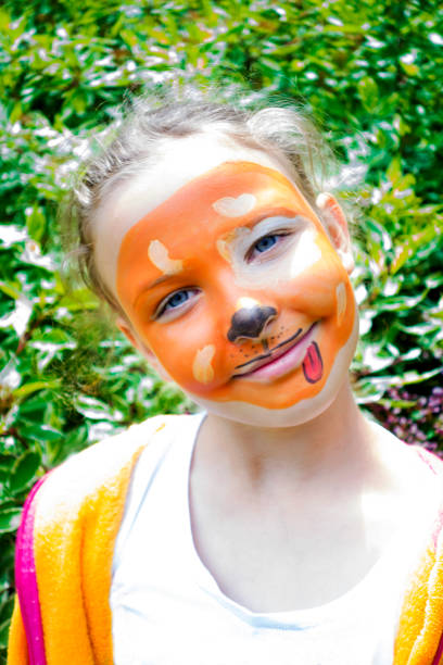 istock Girl with Painted Face 1140560019