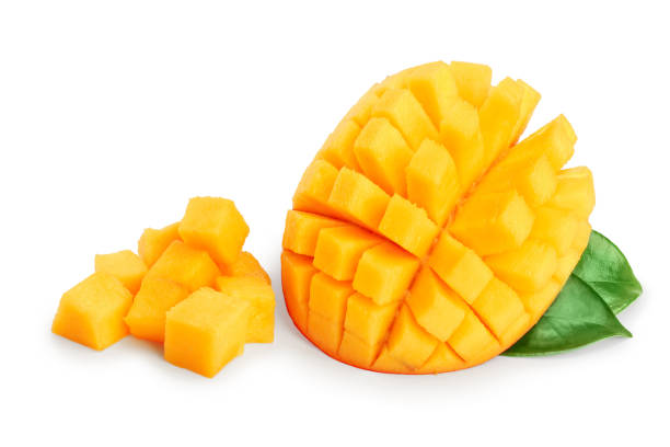 istock Mango fruit half with leaves and slices isolated on white background close-up 1140561956