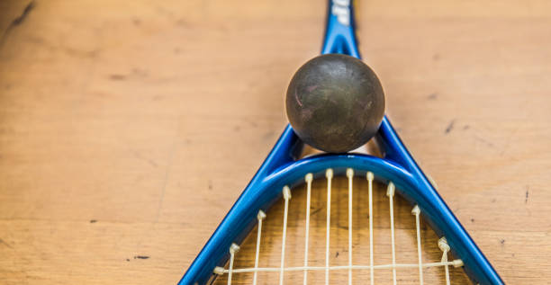istock squash ball on court with squash racket ready to play new game 1140563429