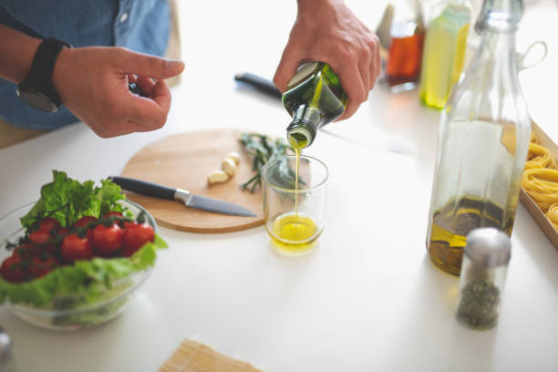 istock Man preparing ingredients for vegetable salad 1140563974